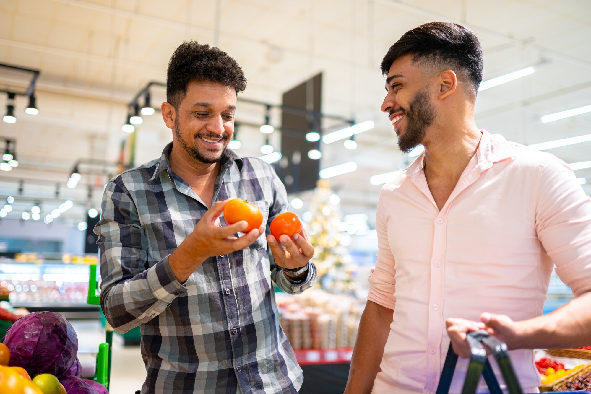 latin american gay couple picking tomatoes supermarket 63135 1603
